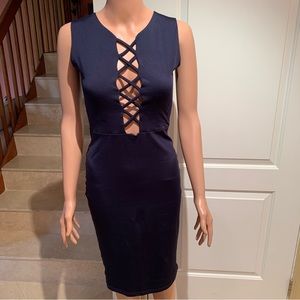 ROMASTORY. High neck dress w/centre front cutout & stunning criss cross …